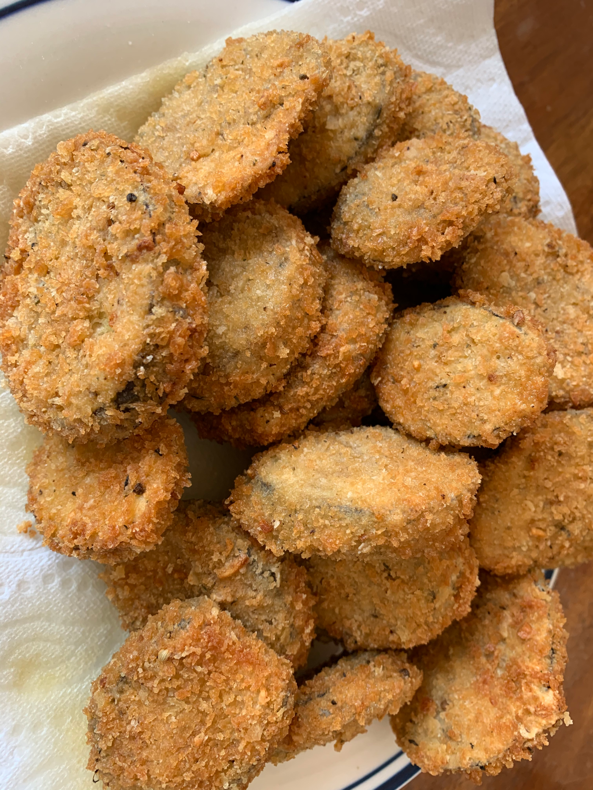 " Crispy fried eggplant slices on a plate homemade appetizer recipe"